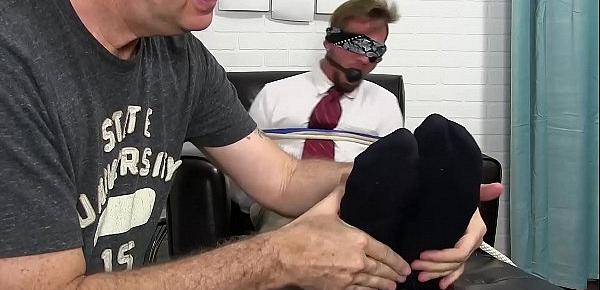 Good looking stud tied up and gagged while toe sucked